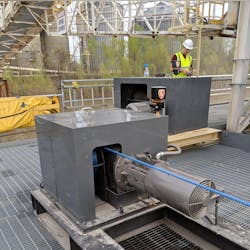 SLM synthetic rope barge breasting winch with NORD gearmotor at an inland grain elevator. SLM synthetic rope barge breasting winch with NORD gearmotor at an inland grain elevator.
