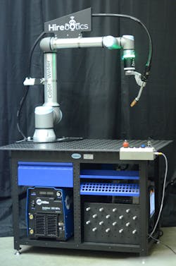 Hirebotics’ Cobot Welder is a complete welding robot system that comes with a UR10e cobot from Universal Robots, a Miller Invision 352-MPa cobot package, a Tregaskiss robotic torch, a mobile cart (with standard 5/8-in. dia. on 2-in. center hole pattern), and Beacon software for easy programming, support, and process monitoring. Hirebotics’ Cobot Welder is a complete welding robot system that comes with a UR10e cobot from Universal Robots, a Miller Invision 352-MPa cobot package, a Tregaskiss robotic torch, a mobile cart (with standard 5/8-in. dia. on 2-in. center hole pattern), and Beacon software for easy programming, support, and process monitoring.