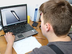 Len Kodlin creates the CNC programs for many self-designed components -- here, a decorative part to be formed in aluminum -- at an external CAD/CAM workstation. Len Kodlin creates the CNC programs for many self-designed components -- here, a decorative part to be formed in aluminum -- at an external CAD/CAM workstation.