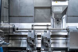 The M40 MILLTURN with a 10-foot (3,000 millimeters) center distance and a turning diameter of 1.7 feet (520 millimeters) is producing a tie shaft with a length of approx. 5 feet (1,500 millimeters) and a diameter of 3 inches (74 millimeters) in three clampings. The production time of the workpiece is around seven hours. The technological highlight is the extremely demanding internal machining with a vibration-damped boring bar as well as the high demands on component accuracy. The M40 MILLTURN with a 10-foot (3,000 millimeters) center distance and a turning diameter of 1.7 feet (520 millimeters) is producing a tie shaft with a length of approx. 5 feet (1,500 millimeters) and a diameter of 3 inches (74 millimeters) in three clampings. The production time of the workpiece is around seven hours. The technological highlight is the extremely demanding internal machining with a vibration-damped boring bar as well as the high demands on component accuracy.