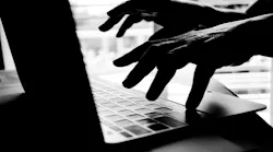 cyber-attack-hands-laptop