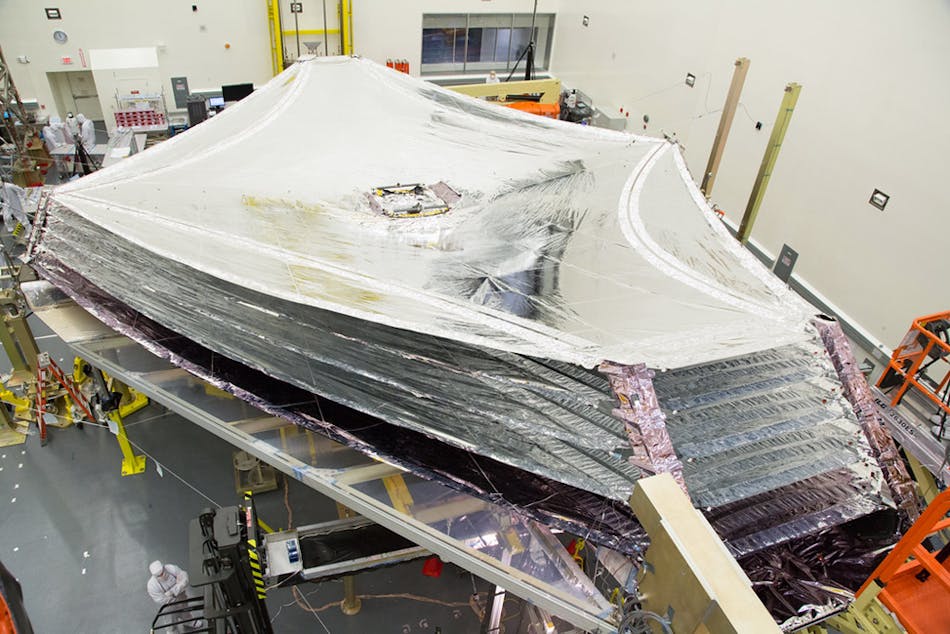 Photo of the fully deployed sunshield in the Northrop Grumman cleanroom.