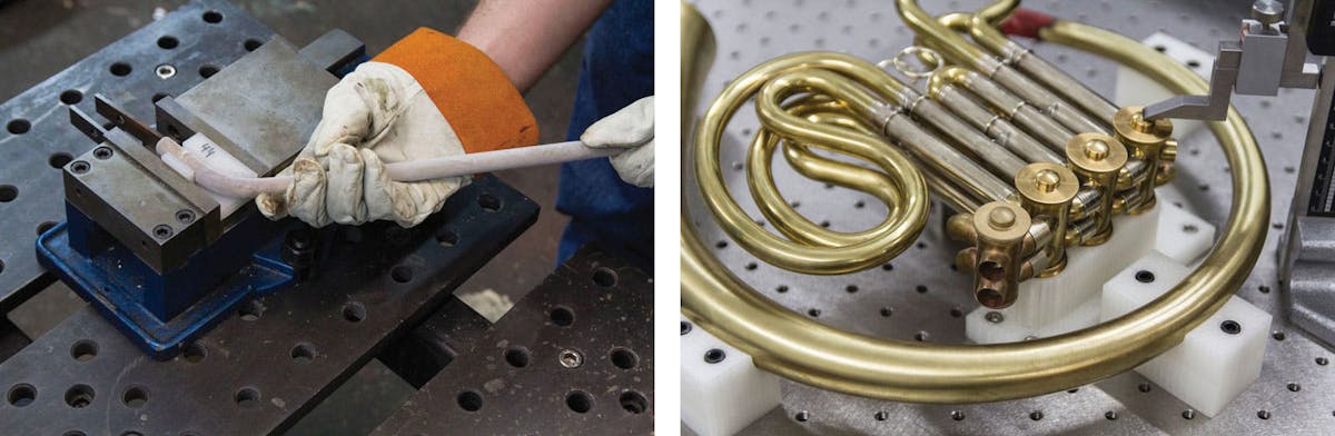 Non-marring 3D fixtures are used to make and check tubing used on a French horn, ensuring the brass will not be marked up or marred.