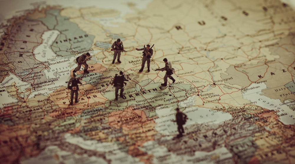 Soldiers on Map Invading Ukraine