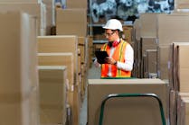 warehouse worker scanning boxes