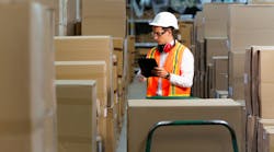 warehouse worker scanning boxes