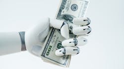 close-up view of robot holding dollar banknotes