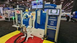 A mobile robot autonomously manages a machine tool at Yaskawa's booth at the AUTOMATE trade show in Detroit, MI. A mobile robot autonomously manages a machine tool at Yaskawa's booth at the AUTOMATE trade show in Detroit, MI.