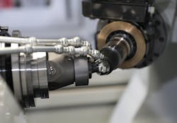 Figure 3: Femoral ball honing operation Figure 3: Femoral ball honing operation