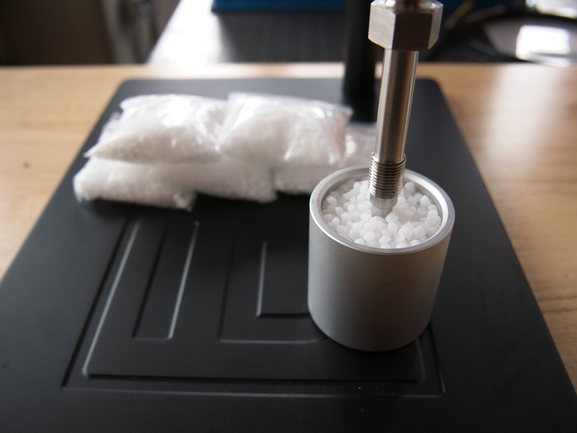 Raman system analysis is useful for the compositional analysis of reactants going into a chemical reaction.