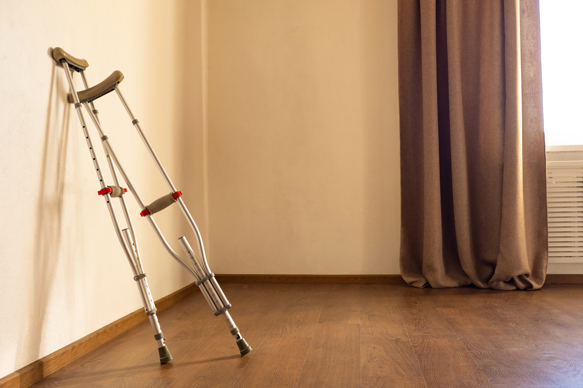 crutches leaning on wall