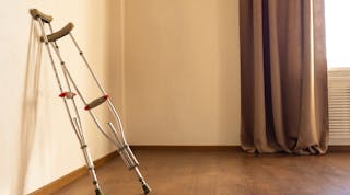 crutches leaning on wall