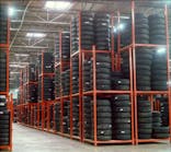 For tire manufacturing, portable racks can be loaded with tires and stored in a distribution center, and then the same racks can be used to ship them to the dealer.
