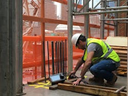 Construction Worker Inspecting Concrete Construction Worker Inspecting Concrete