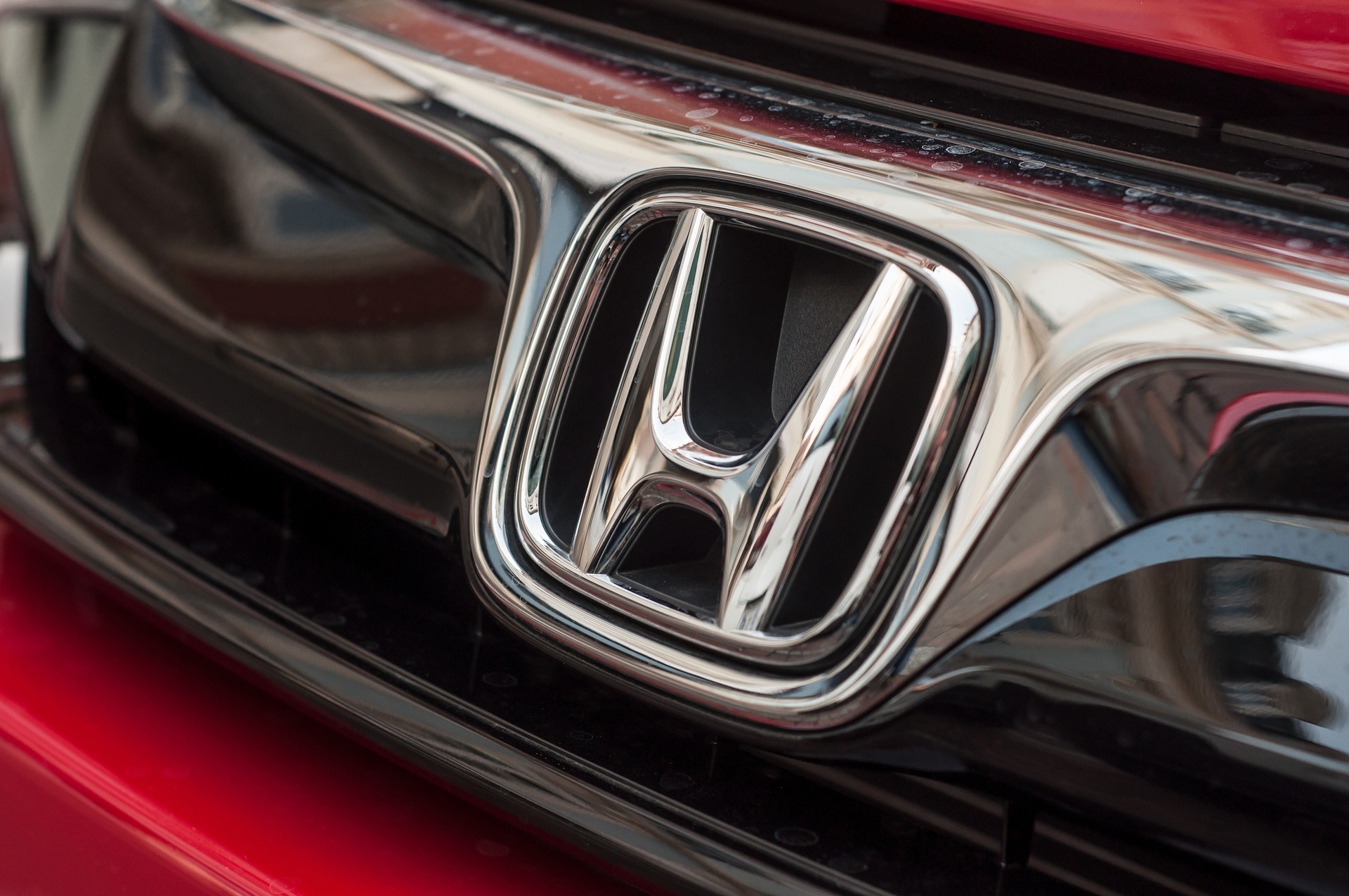 Close-up of Honda car emblem