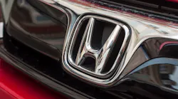 Close-up of Honda car emblem