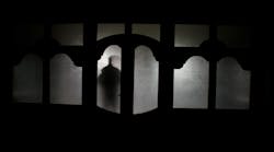 Silhouette Of An Unknown Shadow Figure On A Door Silhouette Of An Unknown Shadow Figure On A Door