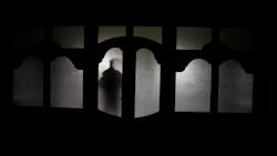 Silhouette Of An Unknown Shadow Figure On A Door Silhouette Of An Unknown Shadow Figure On A Door