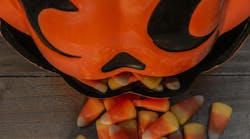 Ceramic Pumpkin Candy Dish With Candy Corn Spilling Out Ceramic Pumpkin Candy Dish With Candy Corn Spilling Out