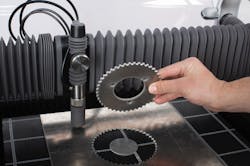 Small-footprint waterjet cutting machine. Small-footprint waterjet cutting machine.