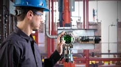 MSA worker checking gas detection instrument MSA worker checking gas detection instrument