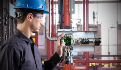 MSA worker checking gas detection instrument MSA worker checking gas detection instrument