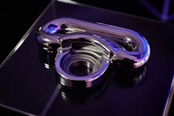 The metal seat belt D-ring on the Cadillac CELESTIQ, GM's first safety-related additively manufactured part. The metal seat belt D-ring on the Cadillac CELESTIQ, GM's first safety-related additively manufactured part.