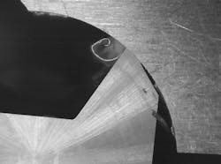 When machining titanium, the highest temperatures are reached near the cutting edge and in the chip. This is evidenced by a light-colored cloud forming around the chip. When machining titanium, the highest temperatures are reached near the cutting edge and in the chip. This is evidenced by a light-colored cloud forming around the chip.