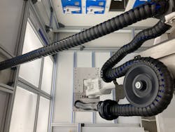 A three-dimensional triflex energy chain with a retraction system is installed on the robot. A three-dimensional triflex energy chain with a retraction system is installed on the robot.