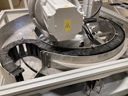 An RBR-type rotary energy chain provides energy and signals to the robot's rotary axis. An RBR-type rotary energy chain provides energy and signals to the robot's rotary axis.