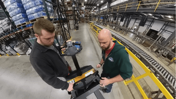 Timothy Ford and Derek Smith of Team Modern pre-release testing the Pallet Mover AMR.