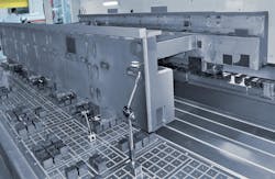 The machine frame of a laser cutting machine is clamped on the table with magnetic clamping. The machine frame of a laser cutting machine is clamped on the table with magnetic clamping.