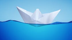 Paper toy ship on water Paper toy ship on water