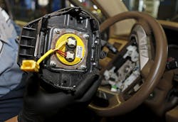 A recalled Takata airbag inflator removed from a Honda Pilot is shown at the AutoNation Honda dealership service department in Miami, Florida, United States on June 25, 2015.