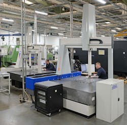 The 2LK CMMs on the shop floor in the turning section at Cross Manufacturing, Devizes, England. In the foreground, senior project manager Mark Bolwell can be seen checking a finish-machined brush seal component on the Evo 15.15.10, while Dave Eldridge is inspecting a fixture on the original, 26-year-old G90C 10.10.8. The 2LK CMMs on the shop floor in the turning section at Cross Manufacturing, Devizes, England. In the foreground, senior project manager Mark Bolwell can be seen checking a finish-machined brush seal component on the Evo 15.15.10, while Dave Eldridge is inspecting a fixture on the original, 26-year-old G90C 10.10.8.