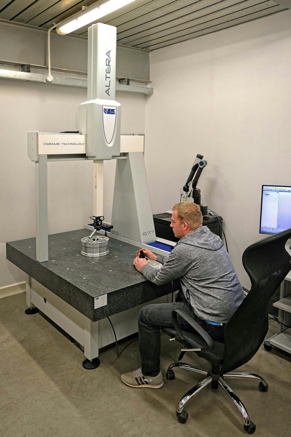 Ray Harris with the new LK AlteraC 10.7.7 CMM in the new inspection room at Driven Engineering&apos;s Havant factory. Due to the limited headroom, LK Metrology reduced the height of the machine during its build in Castle Donington.
