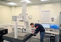 Peter Makosa sets up one of the reduced-height LK Altera S CMMs in the temperature-controlled inspection room at Alltrista's factory in the UK.