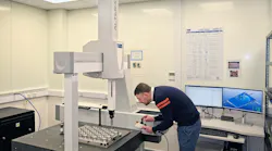 Peter Makosa sets up one of the reduced-height LK Altera S CMMs in the temperature-controlled inspection room at Alltrista's factory in the UK.