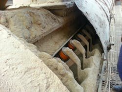 Dust and spillage clog idlers, requiring them to be replaced and raising the cost of operation. Dust and spillage clog idlers, requiring them to be replaced and raising the cost of operation.