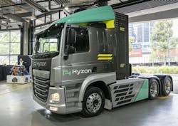 Hyzon’s Prime Mover in the foreground with John Edgley, Managing Director, Hyzon Australia standing by the newly introduced single stack 200kW fuel cell system, which powers the vehicle. Hyzon’s Prime Mover in the foreground with John Edgley, Managing Director, Hyzon Australia standing by the newly introduced single stack 200kW fuel cell system, which powers the vehicle.