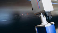 Laser Marking Machine Engraving on plastic water pipes in factory Laser Marking Machine Engraving on plastic water pipes in factory