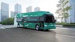 New Flyer's Xcelsior CHARGE FC hydrogen bus driving through a city. New Flyer's Xcelsior CHARGE FC hydrogen bus driving through a city.