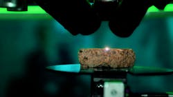 Close-up of ABLASCAN scanning the material of a rock with plasma beam. Close-up of ABLASCAN scanning the material of a rock with plasma beam.