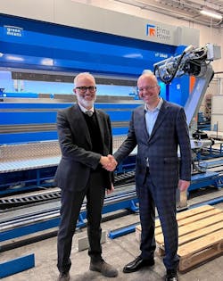 Daniele De Vecchi, CEO of Sistec AM and Giovanni Negri, CEO of Prima Industrie and Prima Power shaking hands. Daniele De Vecchi, CEO of Sistec AM and Giovanni Negri, CEO of Prima Industrie and Prima Power shaking hands.