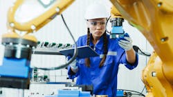female automation machine engineer student inspecting control robot arm female automation machine engineer student inspecting control robot arm