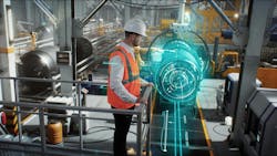 An engineer on a high-tech robotic line for the production of aerospace engines controls information using a modern innovative graphical interface. An engineer on a high-tech robotic line for the production of aerospace engines controls information using a modern innovative graphical interface.