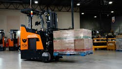 Foxbot Mk3 transporting a pallet in a warehouse Foxbot Mk3 transporting a pallet in a warehouse