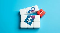 Price tag in blocks, with a percent symbol being added in the middle showing Adding surcharges or extra taxes onto goods/services due to tariffs Price tag in blocks, with a percent symbol being added in the middle showing Adding surcharges or extra taxes onto goods/services due to tariffs