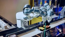 Dual-arm YuMi putting the finishing touches on a burger on the assembly line. Dual-arm YuMi putting the finishing touches on a burger on the assembly line.