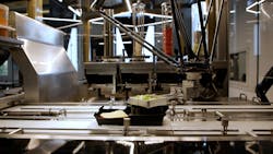 IRB 360 FlexPicker helps assemble the burgers in the restaurant, adding salad. IRB 360 FlexPicker helps assemble the burgers in the restaurant, adding salad.